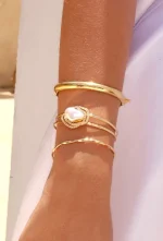 Bracelete Dillan de Pérola Orgânica Cravejada no Ouro, com microzircônias cristais e banho em ouro 18K.